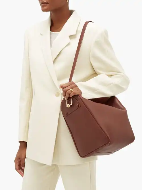 folded medium leather shoulder bag in brown