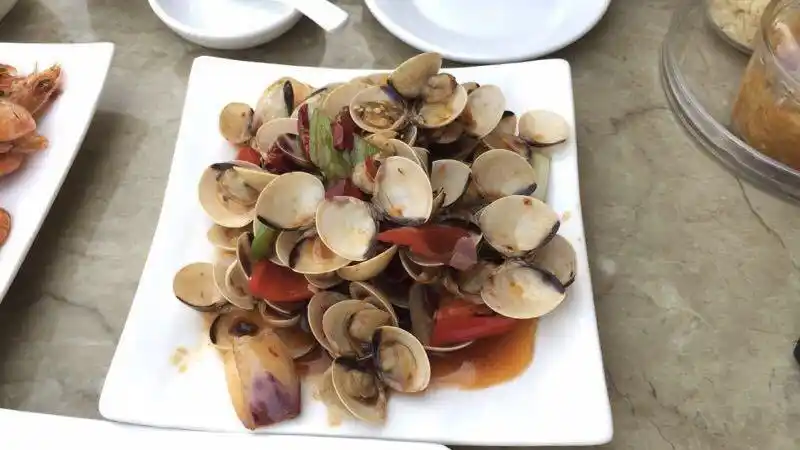 爆炒海白螺是这家店最最推荐的一道菜.因为螺肉很大.