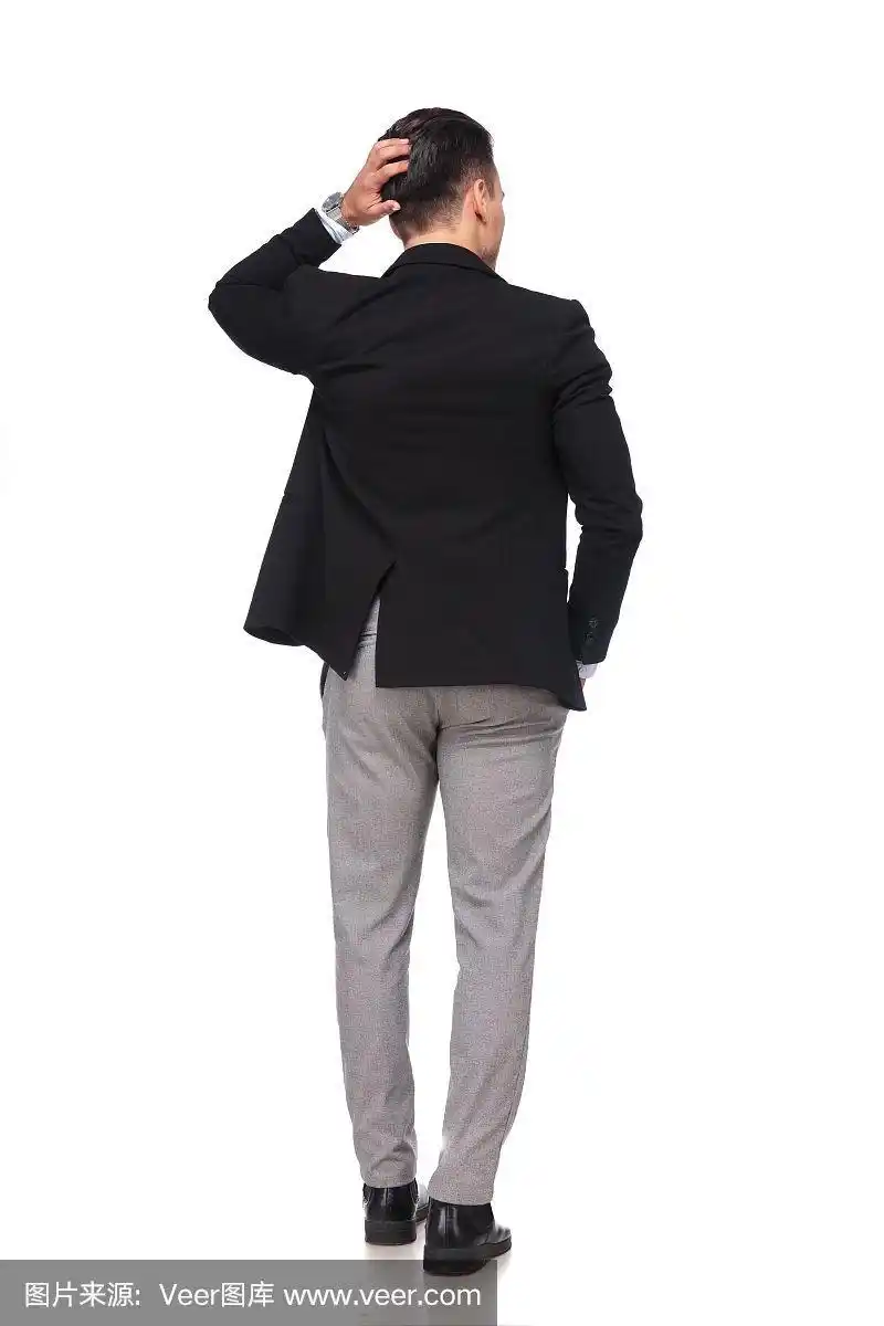 沉思的商人抱着头站着的背影