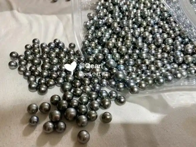一堆珠珠准备打孔去了海水大溪地黑珍珠