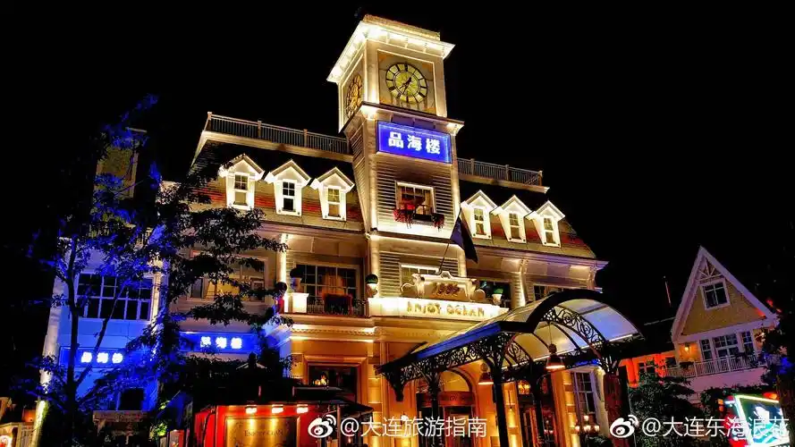 大连渔人码头 劳累了一天的太阳由明到暗 渐渐的隐入山后 晚饭后的