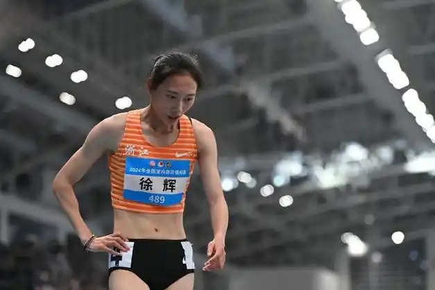 她以9分14.06秒的成绩获胜.图片:新华社记者宋艳华