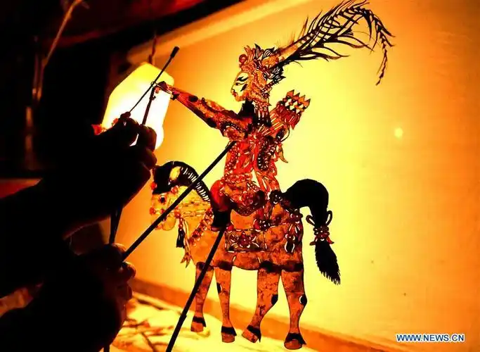 shadow puppetry performed during chinese new year in gansu