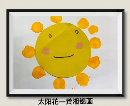 卡纸粘住,再用圆形的海绵工具进行点缀,当做太阳的光芒～再用颜料笔给