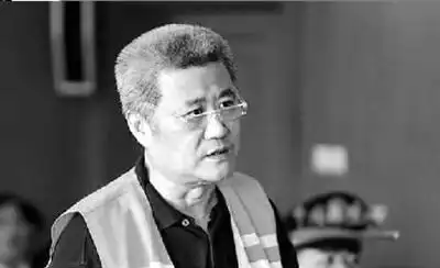 刘建国在法庭上受审