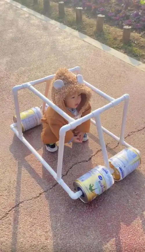 奶粉罐也能造车商丘奶爸为儿子打造手工学步车成本不到十块钱