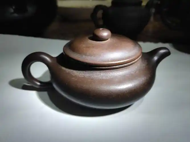 有没有真正的紫砂壶专家,看看这个是不是顾景舟真品