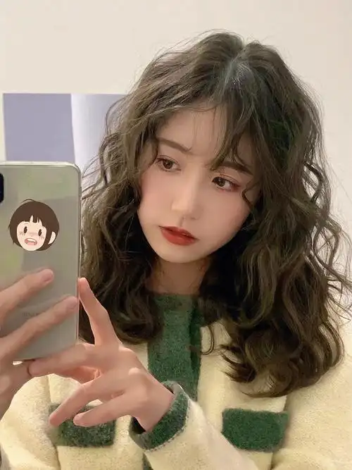 蛋卷头中长发卷发济南烫发推荐