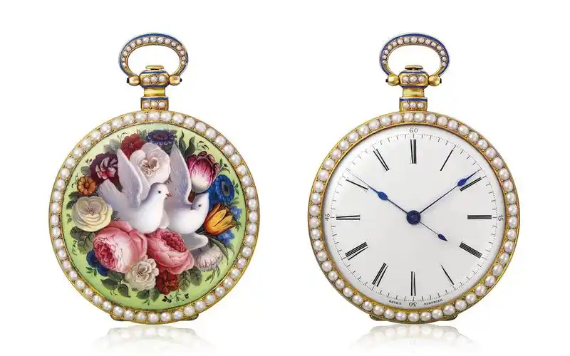 a pair of doves in   nest of flowers