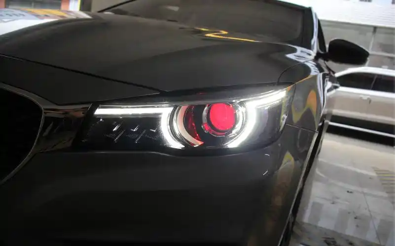 成都车灯改装新款名爵6改装升级海拉5车灯氙气透镜 红色恶魔眼效果