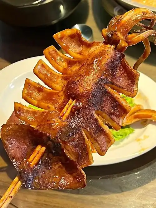 青岛几十年的老店了烤大鱿鱼太绝了