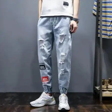 破洞牛仔裤男士2021新款宽松束脚工装裤男生潮牌哈伦九分休闲裤子