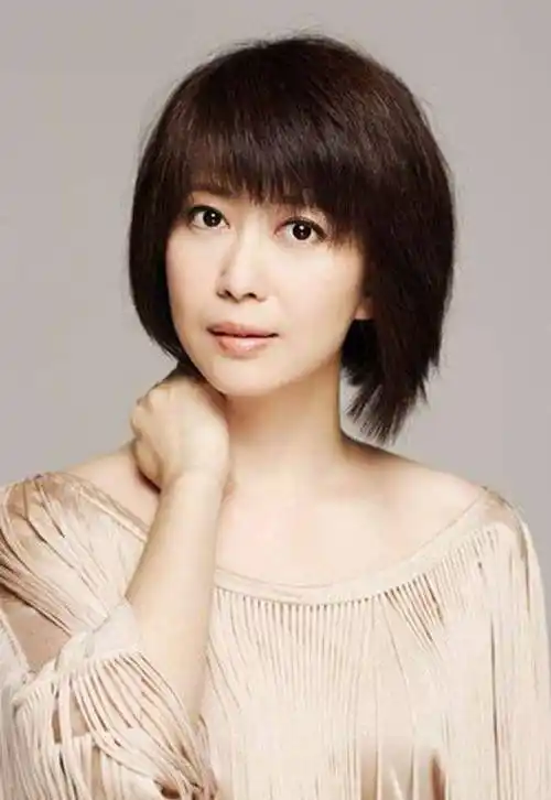 她被称饼干女孩,70后的梦中情人,常年吃素研习佛歌,差点出家_歌曲_风