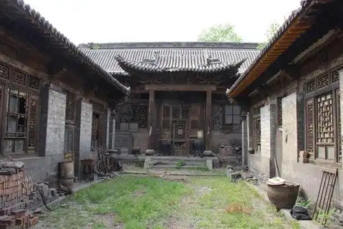 设计公司人员赴交城县义望乔家古宅进行实地勘察_山西省古建筑集团有