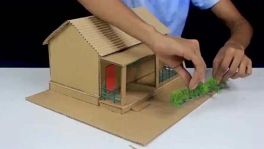 废旧硬纸板不要丢手工达人教你制作漂亮的纸板屋很简单