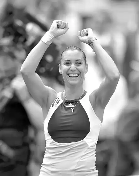 9月11日,意大利选手佩内塔庆祝胜利.(均据新华社)