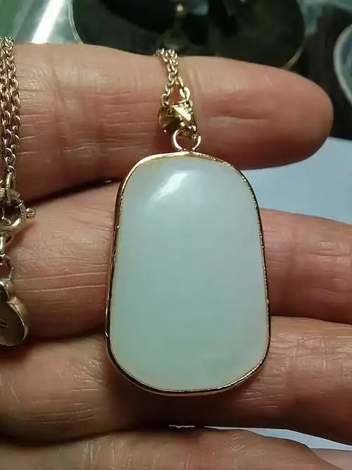 和田玉原籽包18k金吊坠