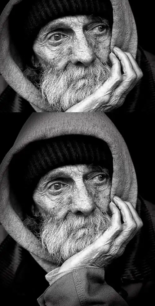 02546_人物素材设计一位国外的老人面容憔悴眼神深邃拄着下巴思考问题