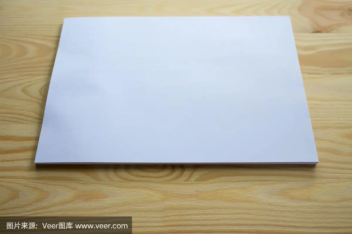 白纸a4大小的木桌纹理背景,头脑风暴,创意,商业理念