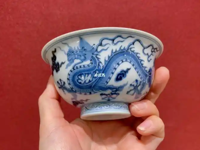 快雪时晴内雕刻双龙压手杯