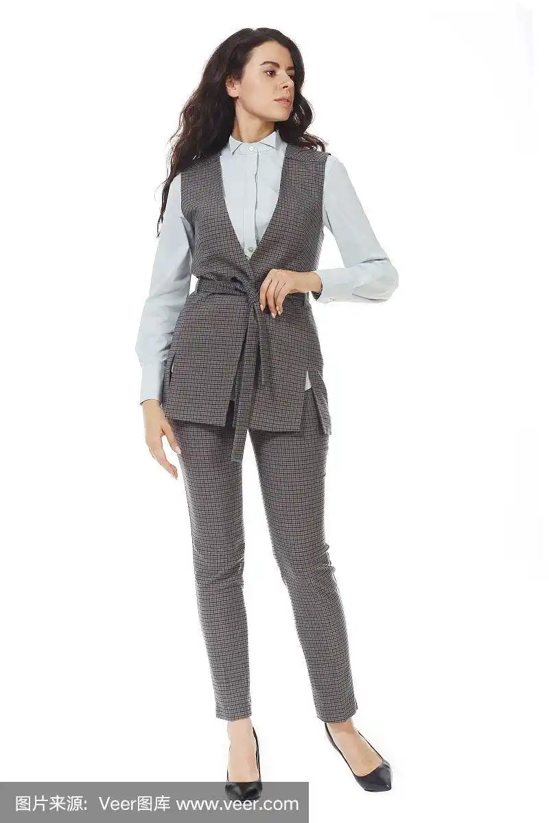 印度商务妇女在羊毛正式背心与腰带裤子高跟鞋全身照片