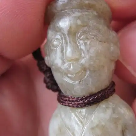 宋代和田玉戏蛇玉人