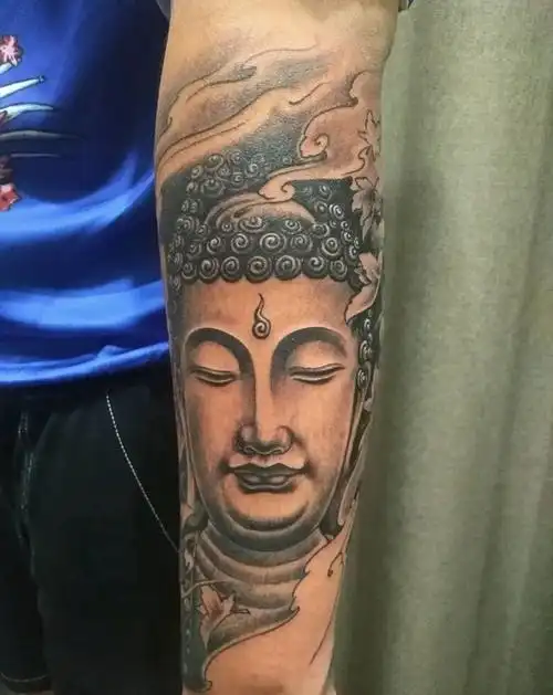 手臂佛纹身图片