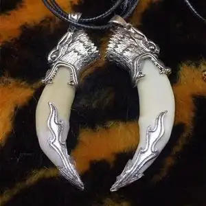 正品狼牙吊坠真狼牙齿图片