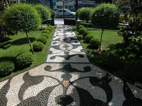 鹅卵石美翻了整个庭院的地面,小小鹅卵石在花园设计中却有大作用