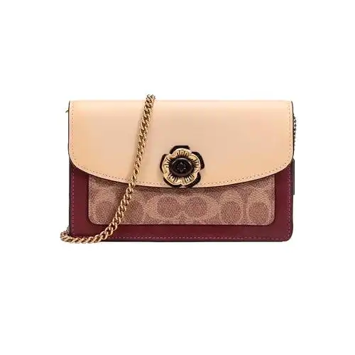 88vip到手预估1281】蔻驰经典山茶花斜挎包,牛皮革材质,手感很有质感