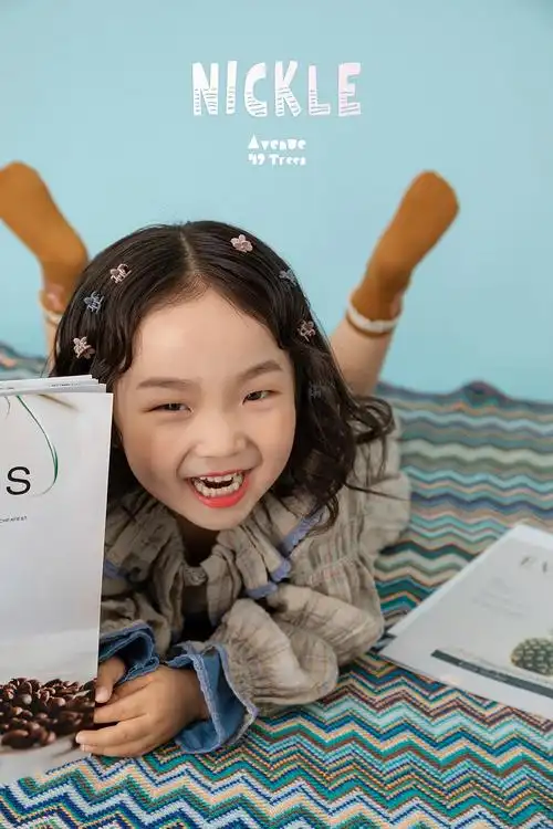 摄影师一笙的儿童摄影作品《可爱羊毛卷》