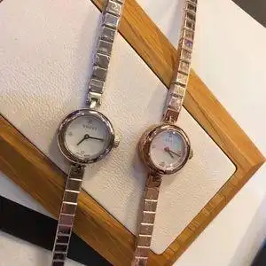 酷奇手表女玫瑰金钢带手链表蓝宝石贝母镶钻精钢石英腕表ya141503