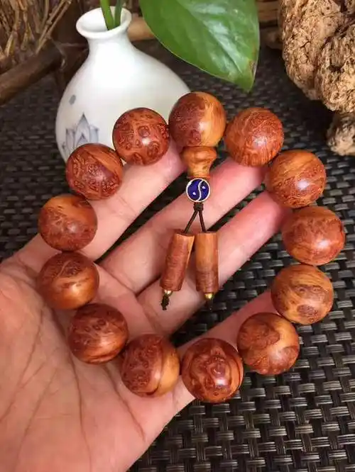 『 琥珀木手串』怎么盘玩-古玩图集网