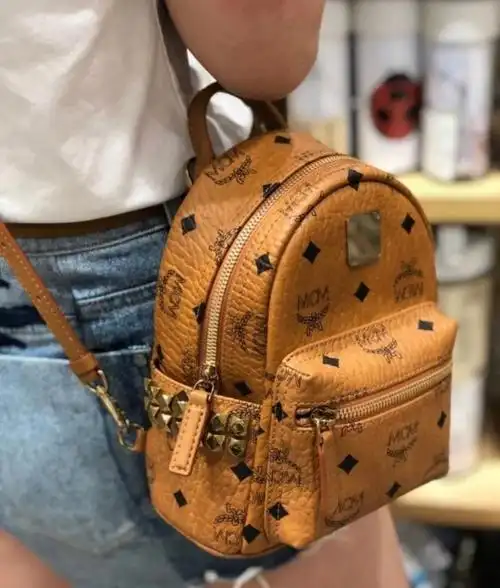 现货mcm棕色金盏花超迷你两用双肩包女包包包斜挎包会8