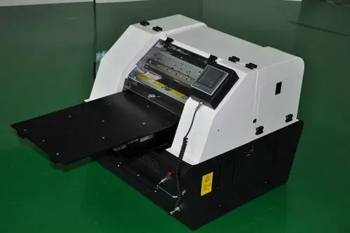 kgt-3290贝壳万能彩印机,手机壳图案打印机 35000元