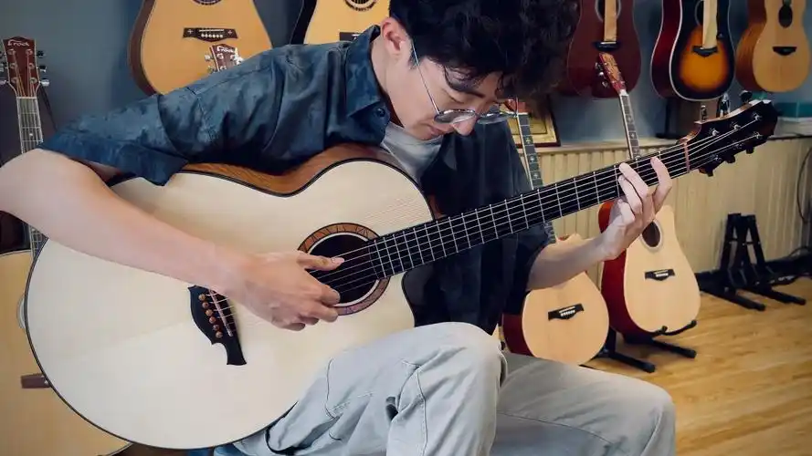 施腾龙手工吉他152#试听,感谢袁满老师的演奏视频!