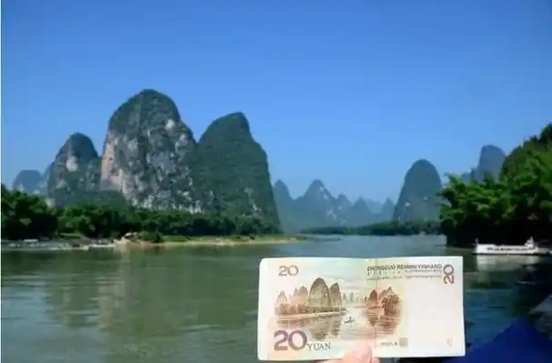 宫体主楼13层,高115米.是西藏著名的地方.100人民币