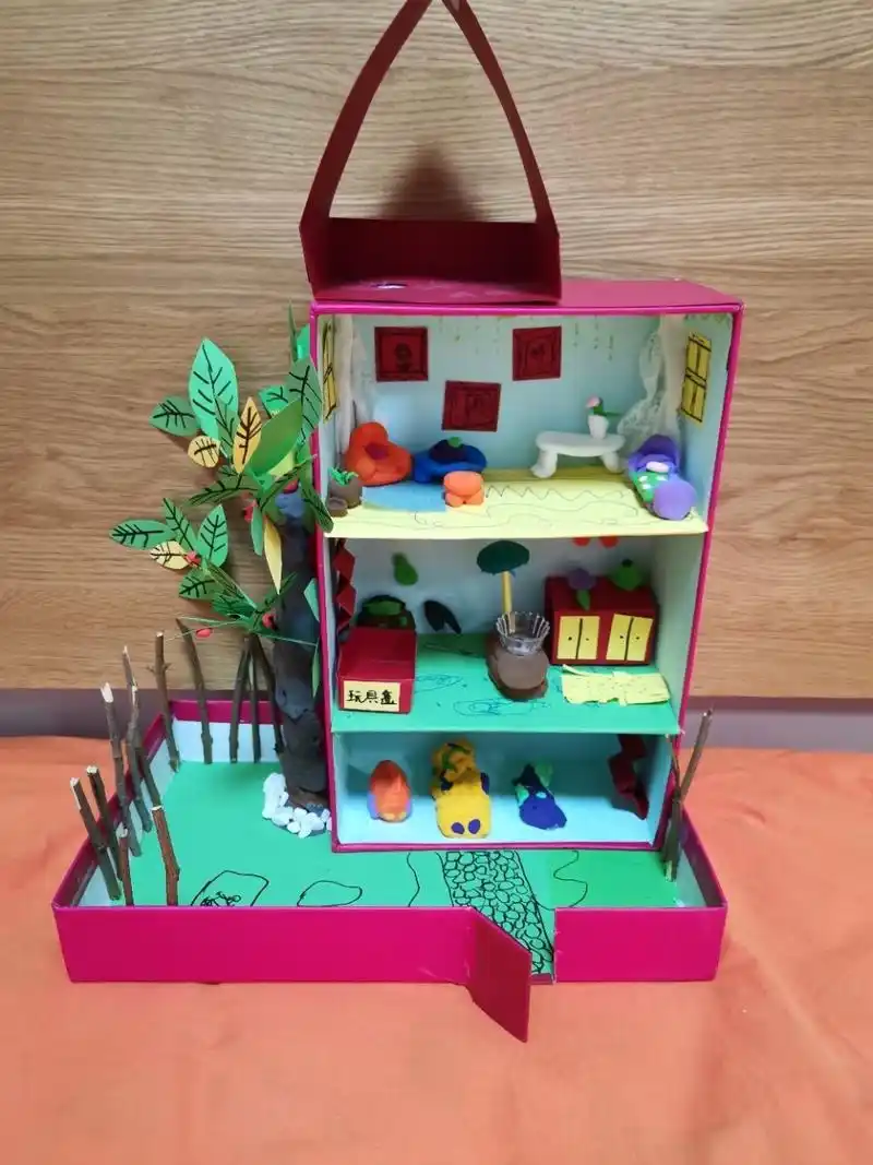 给木头人做一个房子,于是秉承废物利用主张,跟孩子一起用鞋盒制作一个