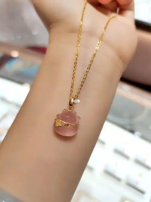 周大生金镶玉吊坠