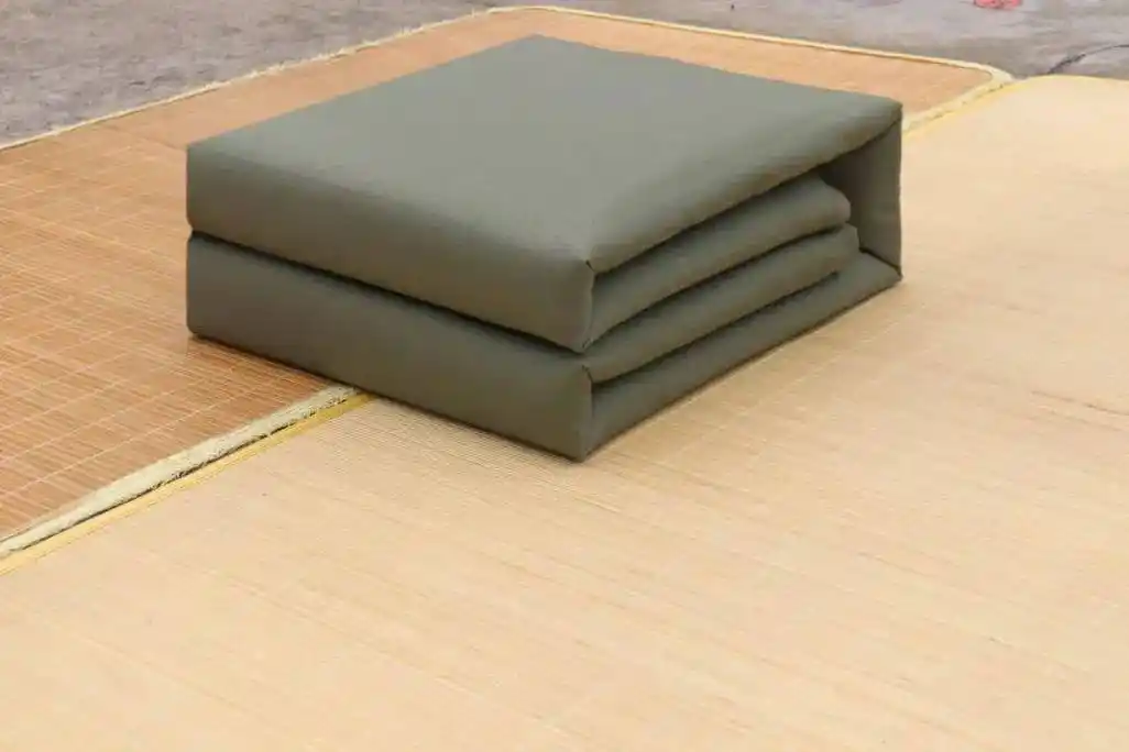 这样一床"豆腐块"的被子基本成型