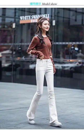 恒源祥21年春秋新款白色微喇叭牛仔裤女紧身垂感高腰流苏加绒毛边长裤