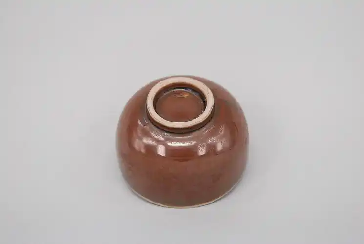 北宋定窑酱釉茶杯