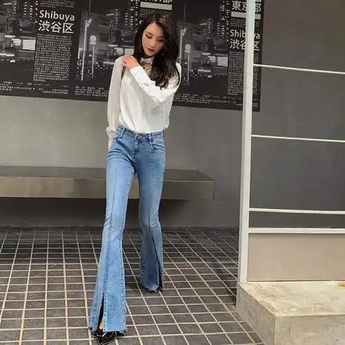 牛仔裤女裤脚个性 开叉_浅色个性开叉微喇牛仔裤女春秋高腰修身喇叭裤