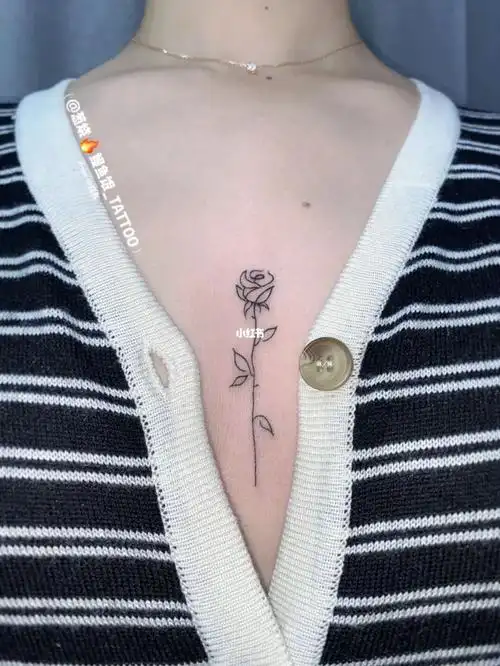 鳗鱼tattoo78胸口的简线条玫瑰08广州纹身