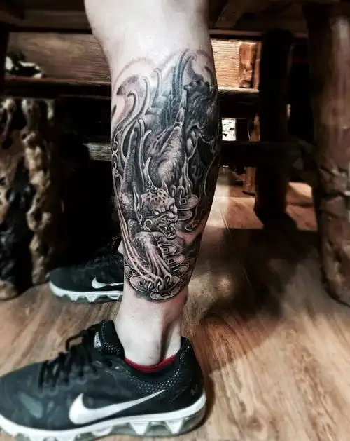 招财貔貅纹身图片_腿部传统成品纹身图案