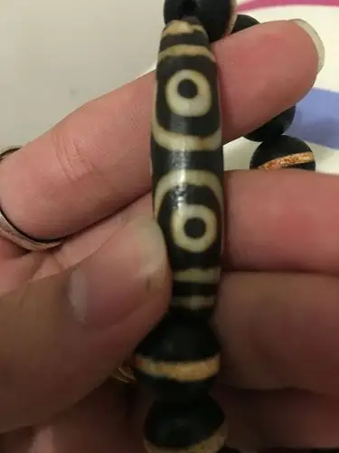 懂的帮我看下这3眼天珠是真是假啊?谢谢大神!