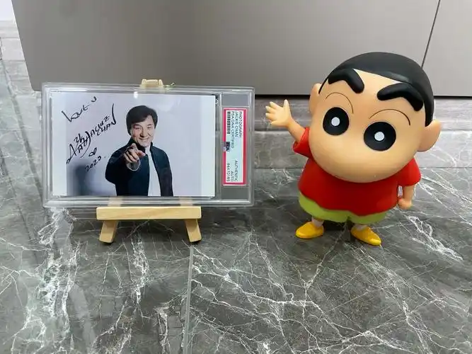 功夫巨星成龙签字签名照亲笔签名照片