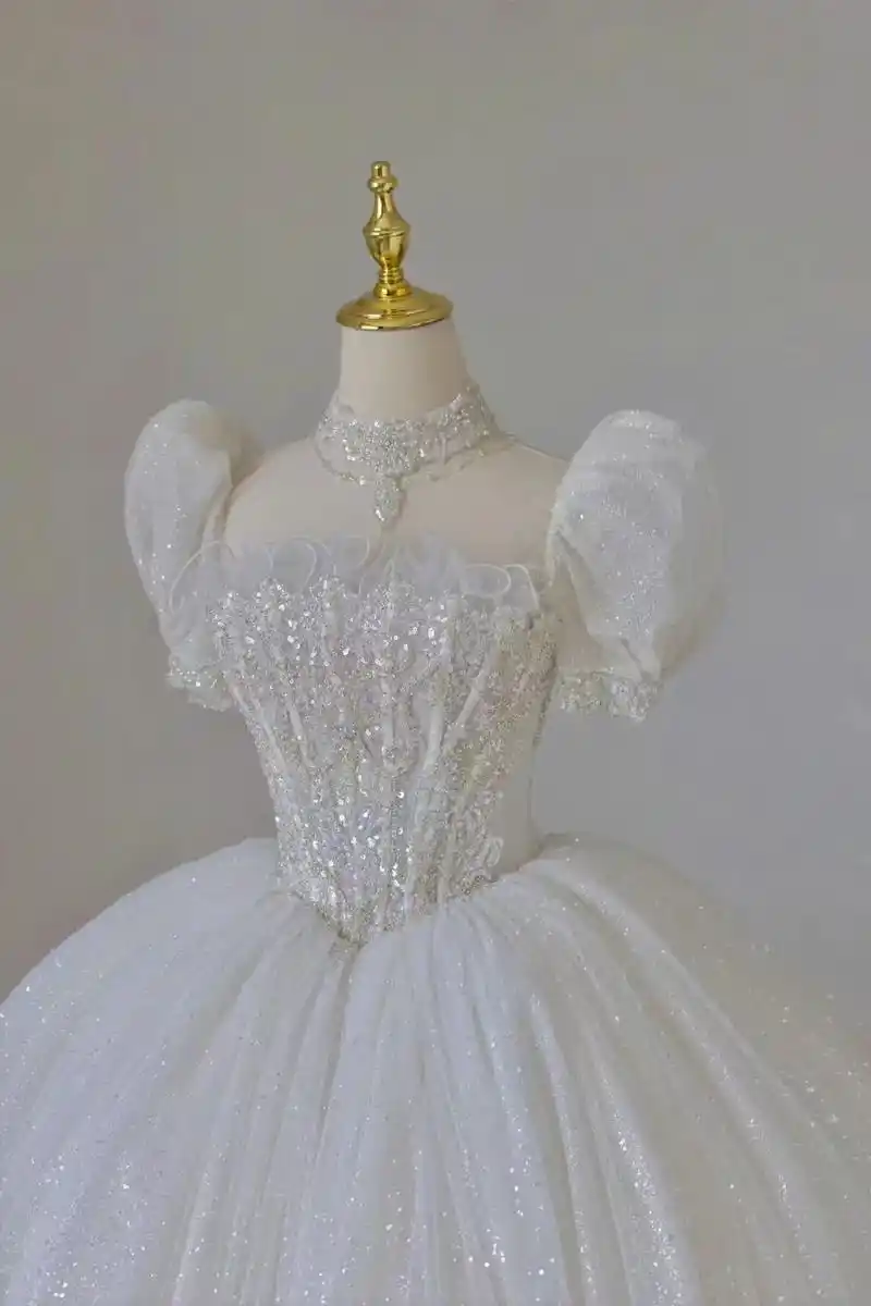 长袖短袖抹胸三穿的长拖尾婚纱.