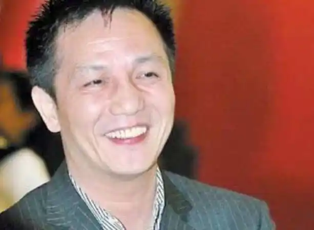 上海"首富"周正毅的江湖路:纵横商政两界,终落法网_欲望_因为_馄饨