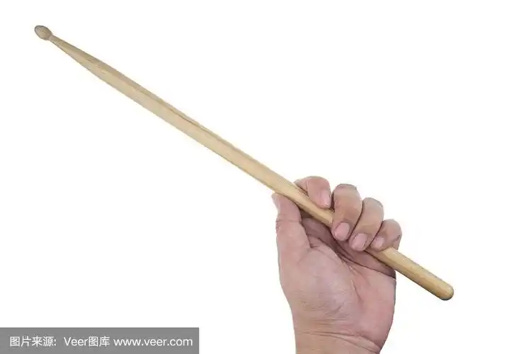 孤立男性左手握鼓棒